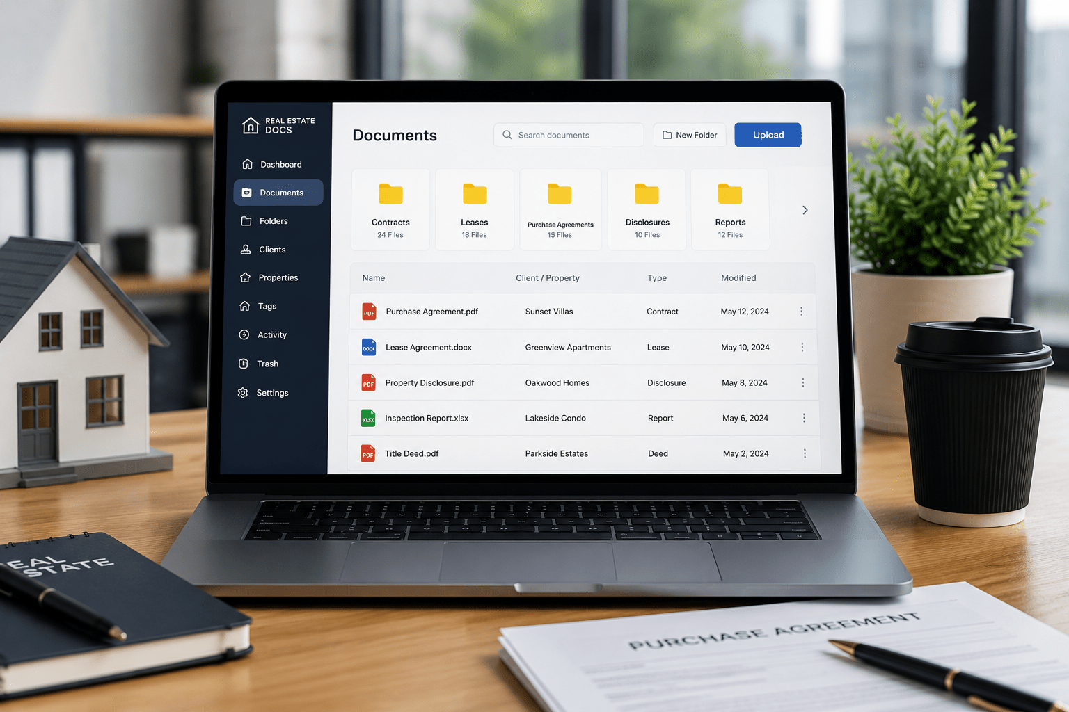 Real Estate Document Management Real estate documents organized on a laptop.